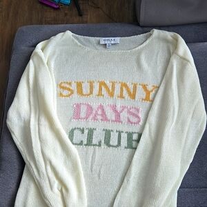 Open weave long sleeve adorable sweater.